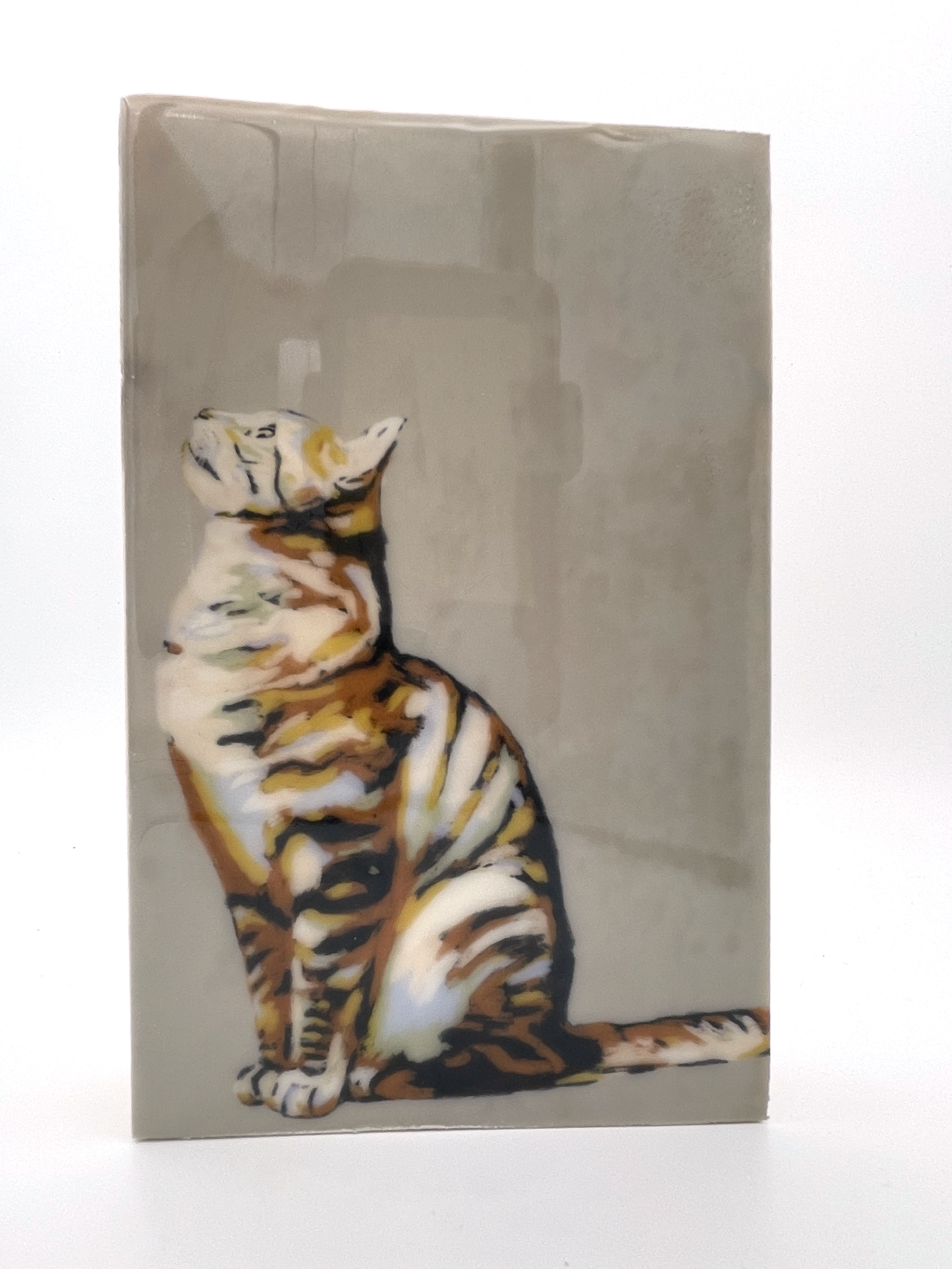 Cat looking Up Wood Tile